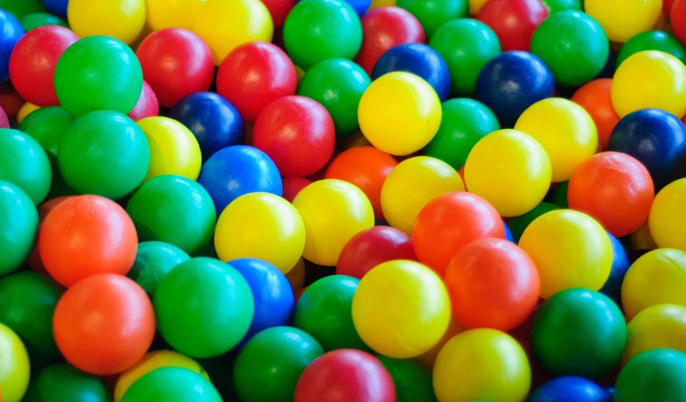 A pile of colorful balls

Description automatically generated with low confidence