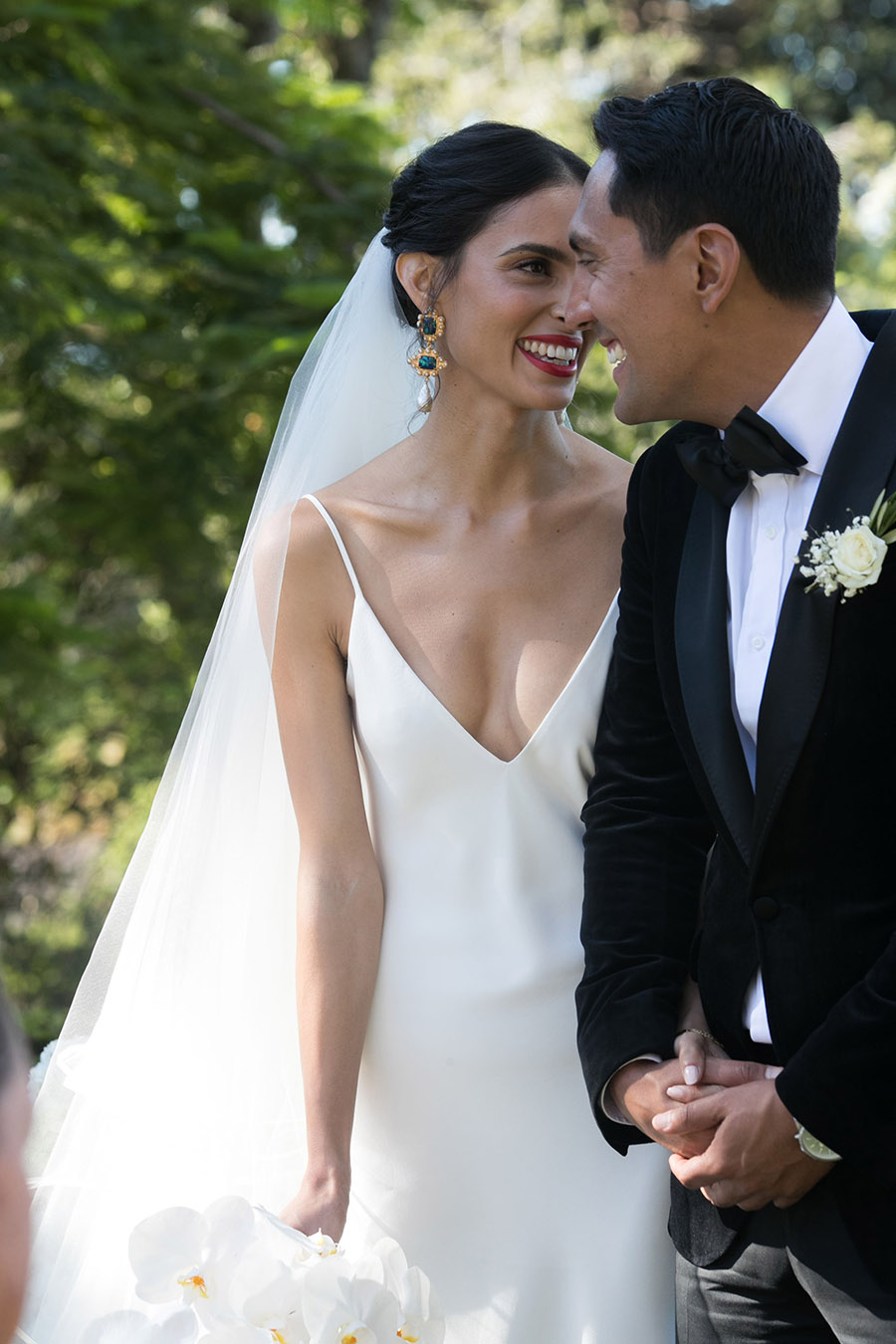 A silk slip on dress for this Italian-inspired wedding.