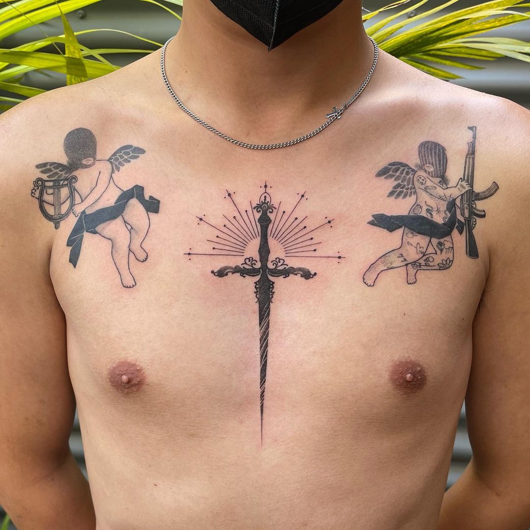 Sword With Angels Tattoo On Man Chest