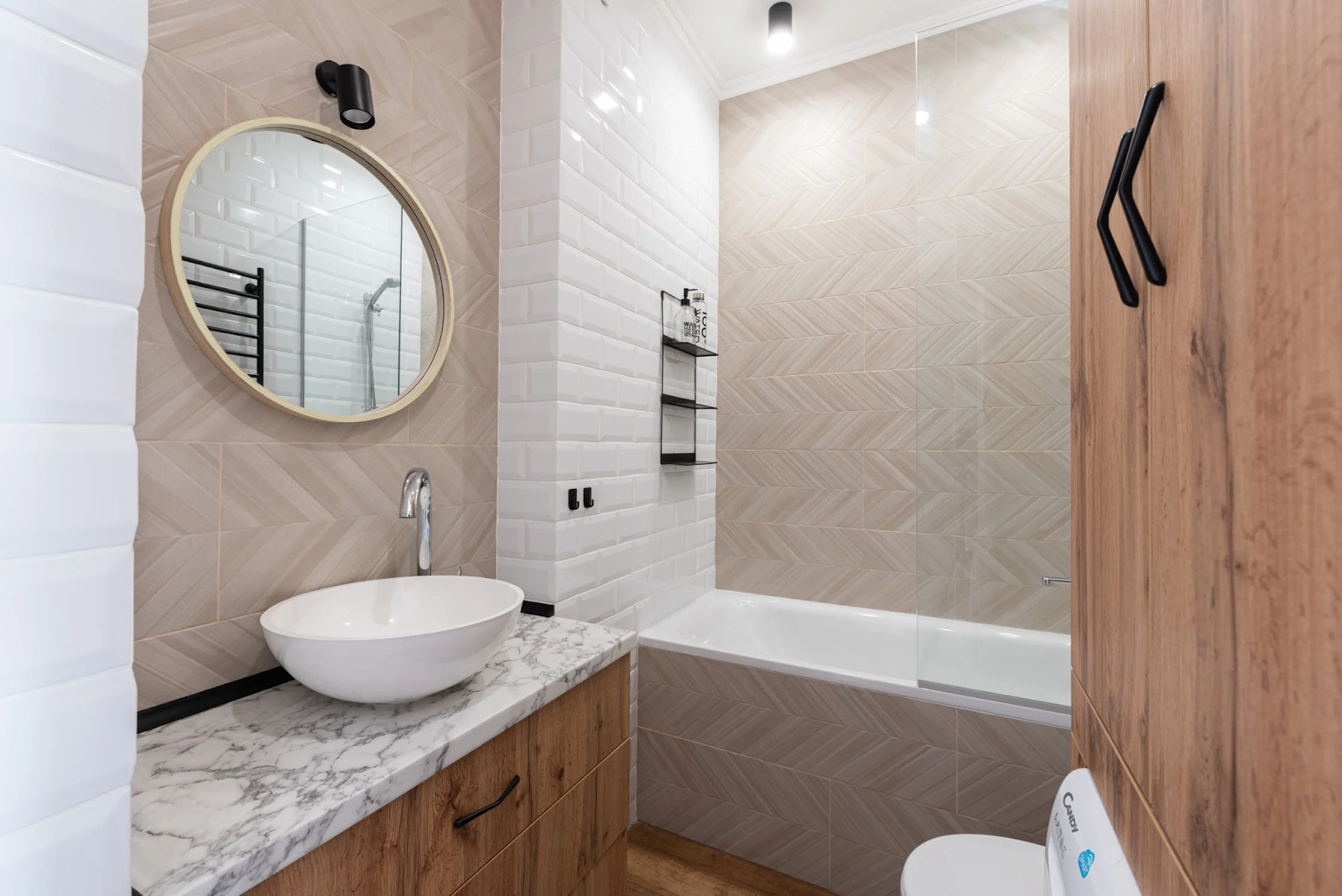 Bathroom with herringbone tile pattern; tile trends 2022; MGSD