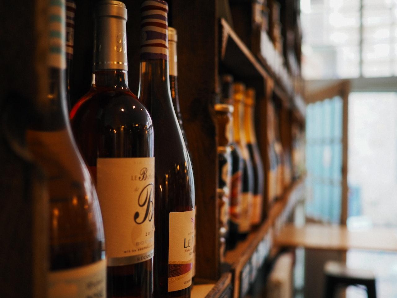 Close-up of a wine rack on the wall.