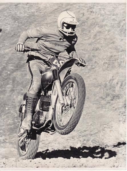 Mary McGee, the trailblazing legend, pops a wheelie on her motorcycle