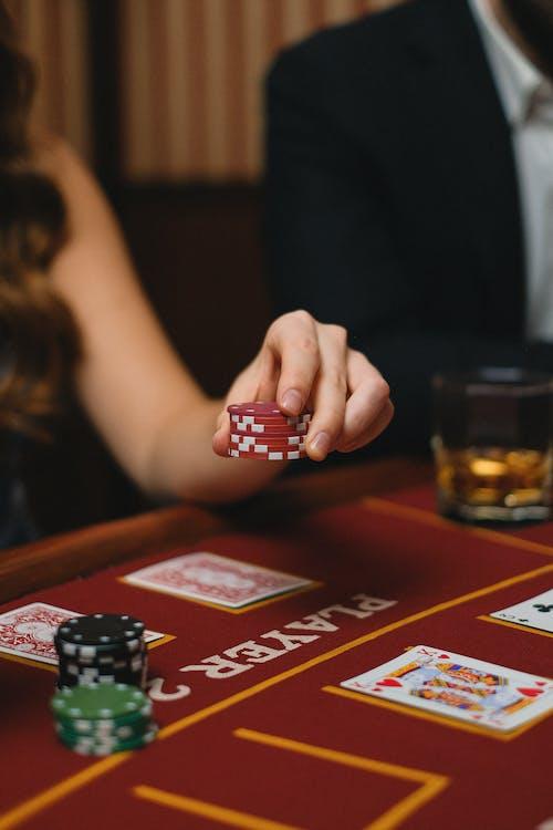 Free Woman with Chips in Casino Stock Photo