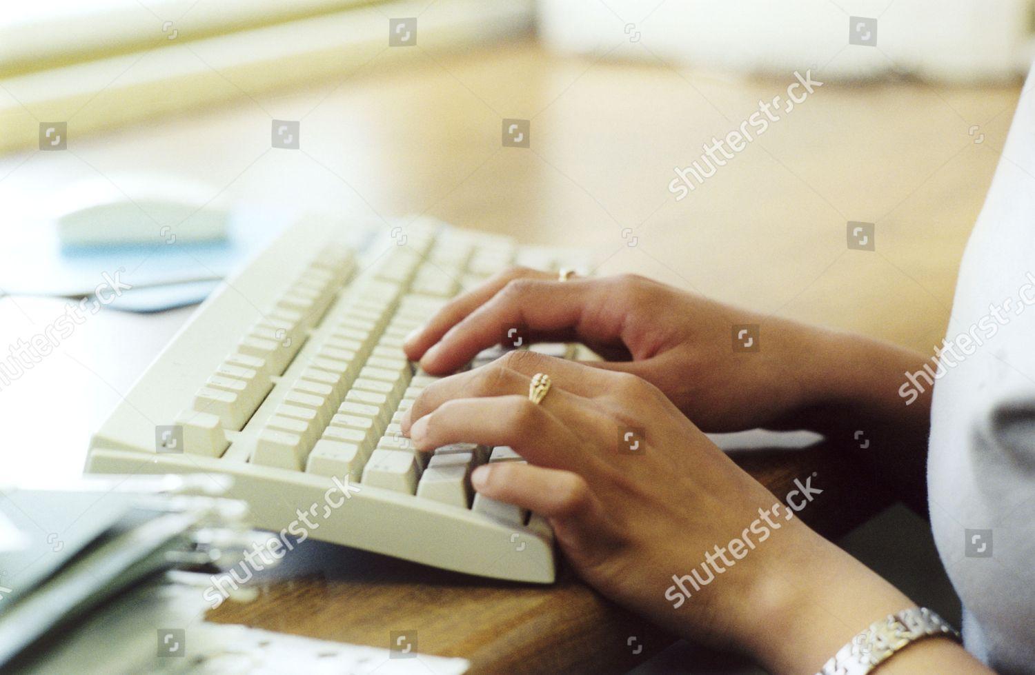 Woman typing computer keyboard UK Editorial Stock Photo - Stock ...