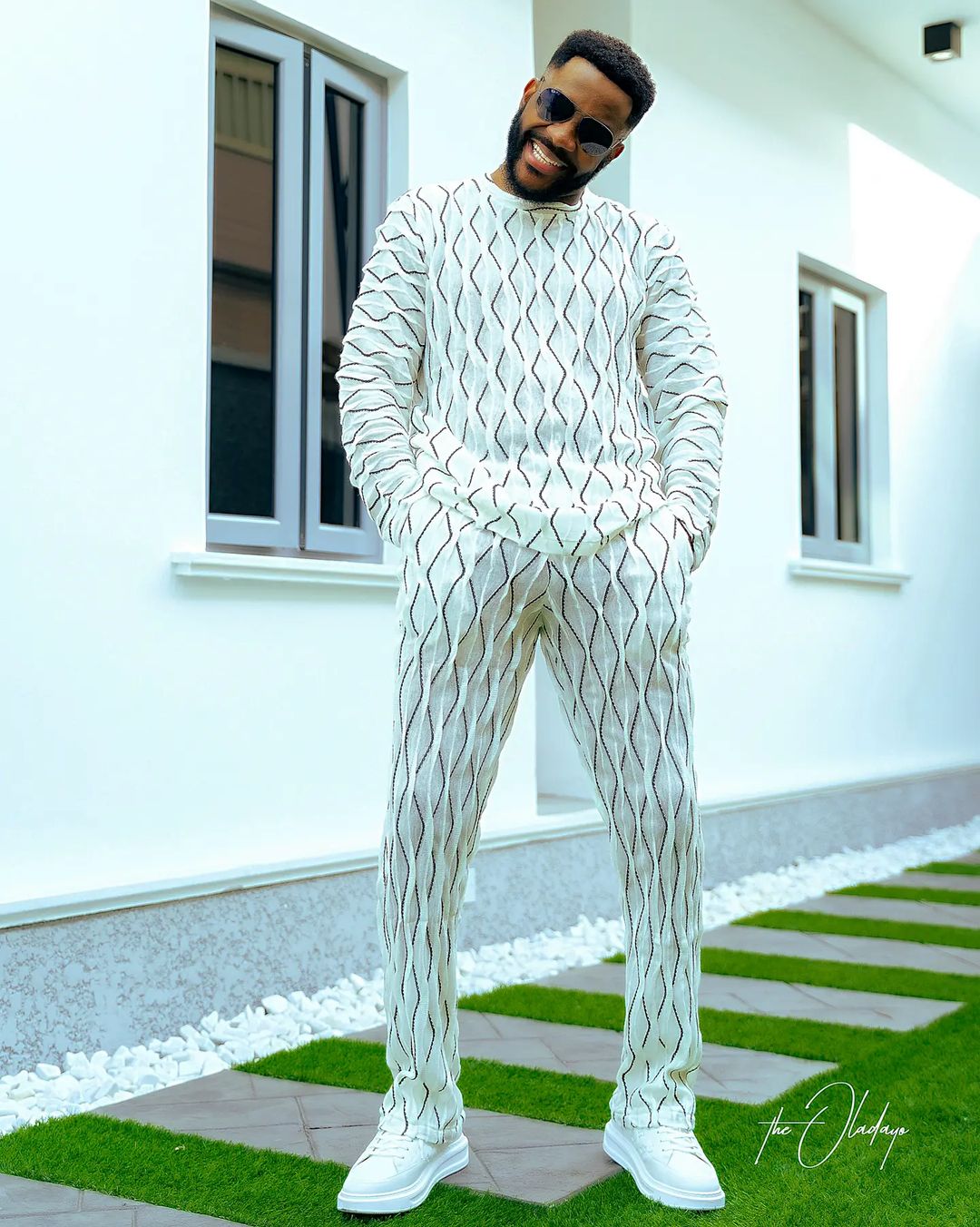 Ebuka Uchendu getting dressed for detty December