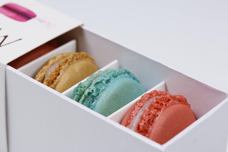 three-brown-teal-and-red-macaroons