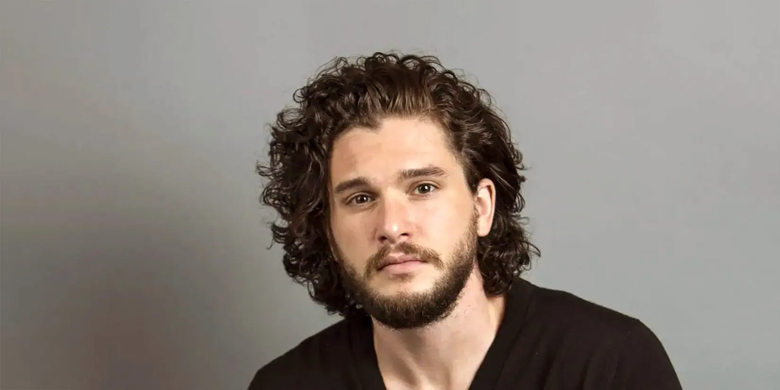 Kit Harington looking cute in his curly hairstyle for men