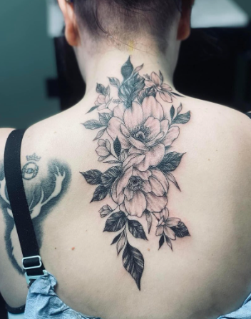 Black And Grey Flowers Back Upper Tattoos Design