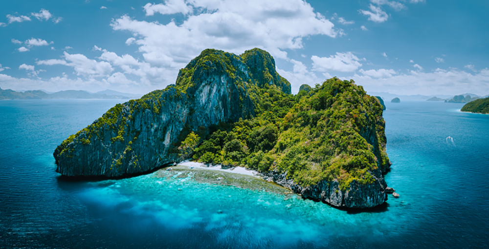 Aerial drone panorama picture of tropical paradise epic Entalula Island. Top Tourist Attraction in El Nido