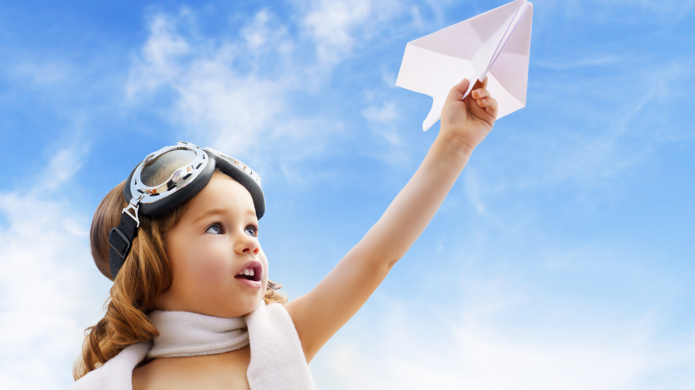 A child holding a piece of paper

Description automatically generated with low confidence