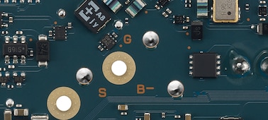 Circuit board featuring reflow solder containing gold