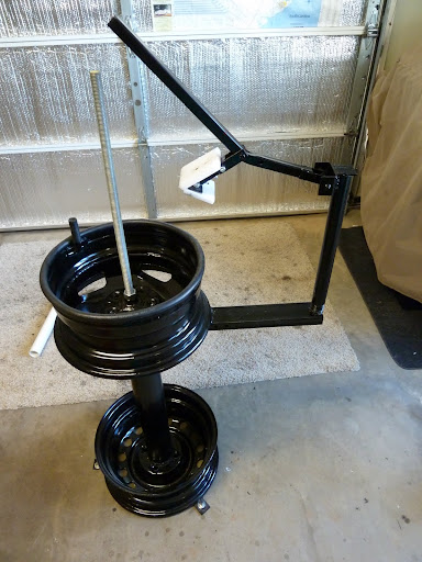 tire changing stand and wheel balancer
