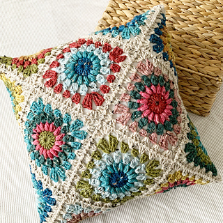 floral granny square pillow on white background