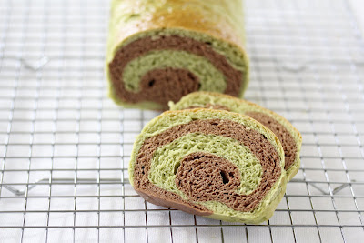 photo of Matcha chocolate swirl bread on a baking rack