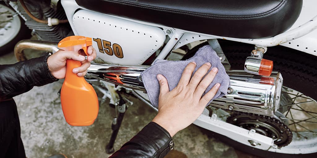 Polishing motorcycle chrome with towel