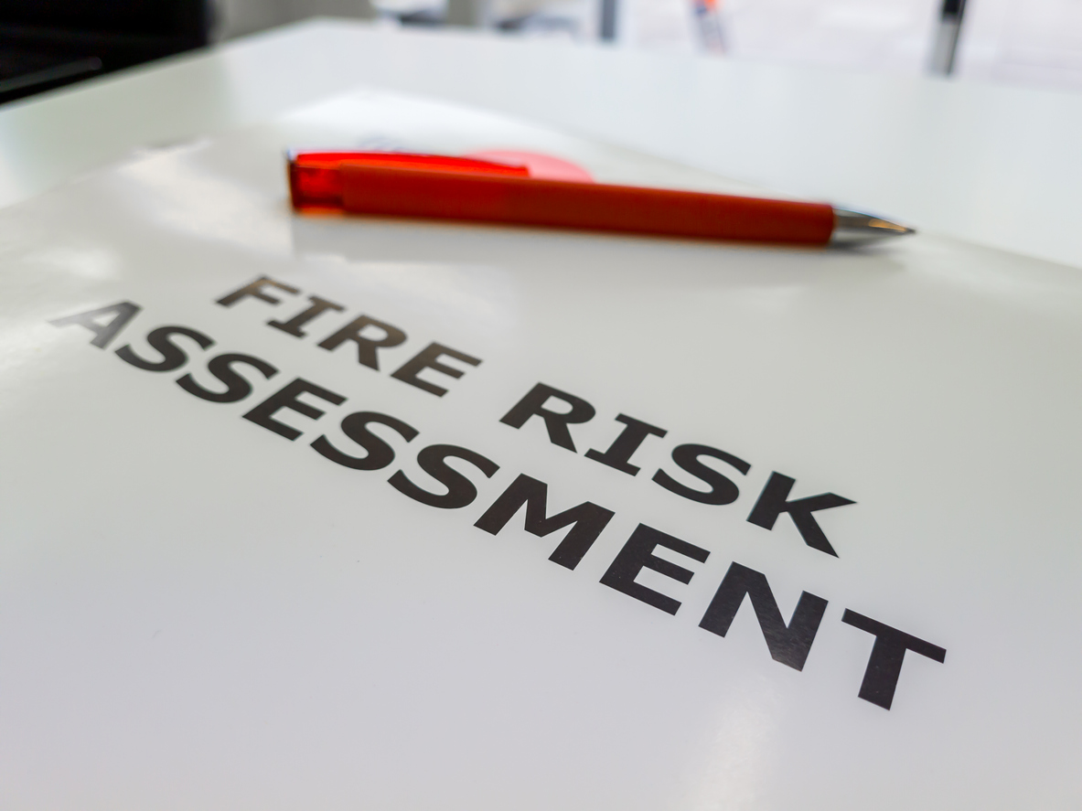 fire risk assessment form with red pen
