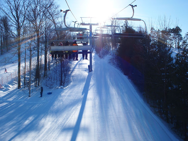 Going up a ski lift