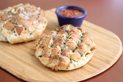 close-up photo of two Blooming Onion Pizza Bread