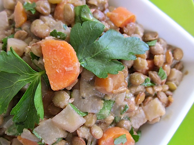 close up of dijon lentil salad in bowl 