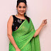  Indian Television Anchor Manjusha in Sleeveless Green Saree 