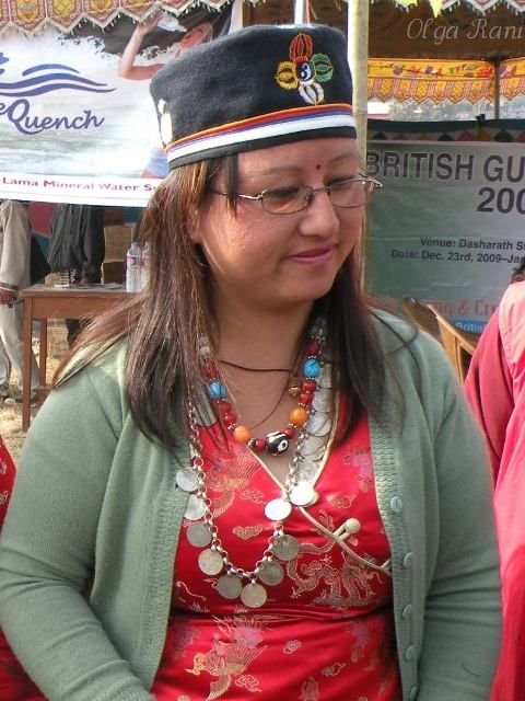 Tamang woman from Nepal wearing coin necklace 