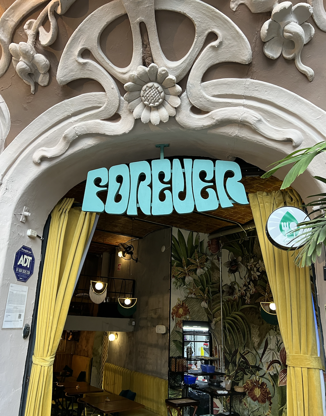 The entrance of a vegan restaurant in Roma Mexico City called Forever