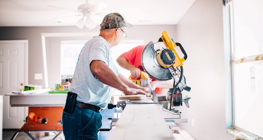 men remodeling a house