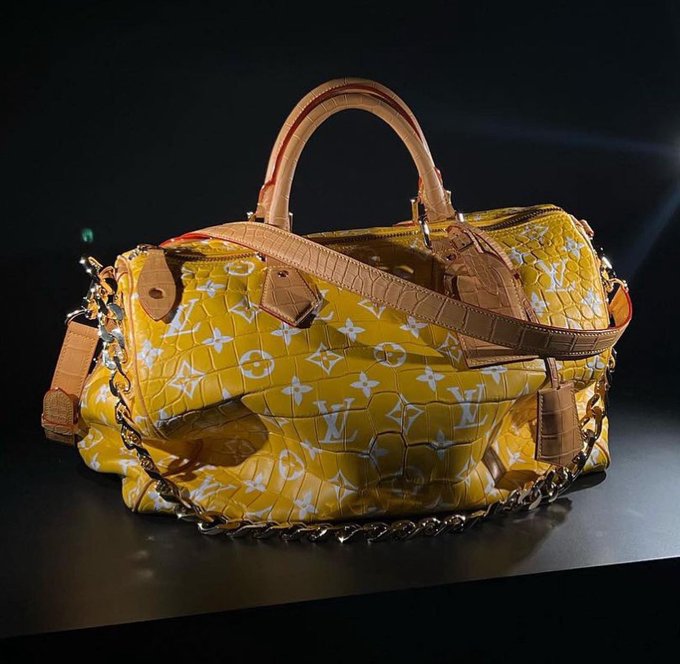 Pharell Flaunts Louis Vuitton 'Millionaire' Bag in Paris Fashion Week