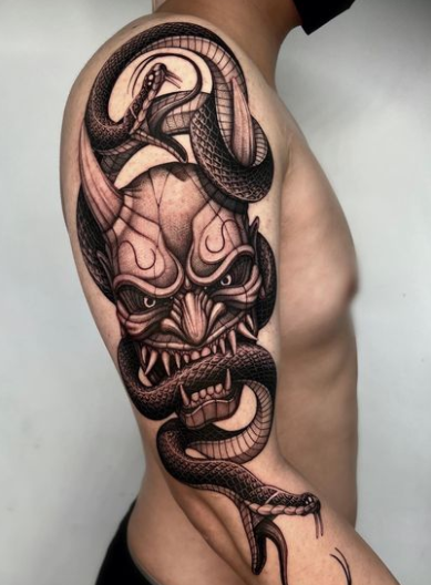 Devil Head With Black Snake Tattoo On Shoulder