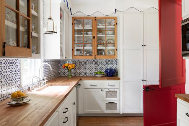 A support kitchen with custom cabinetry and Shaker-style doors. 