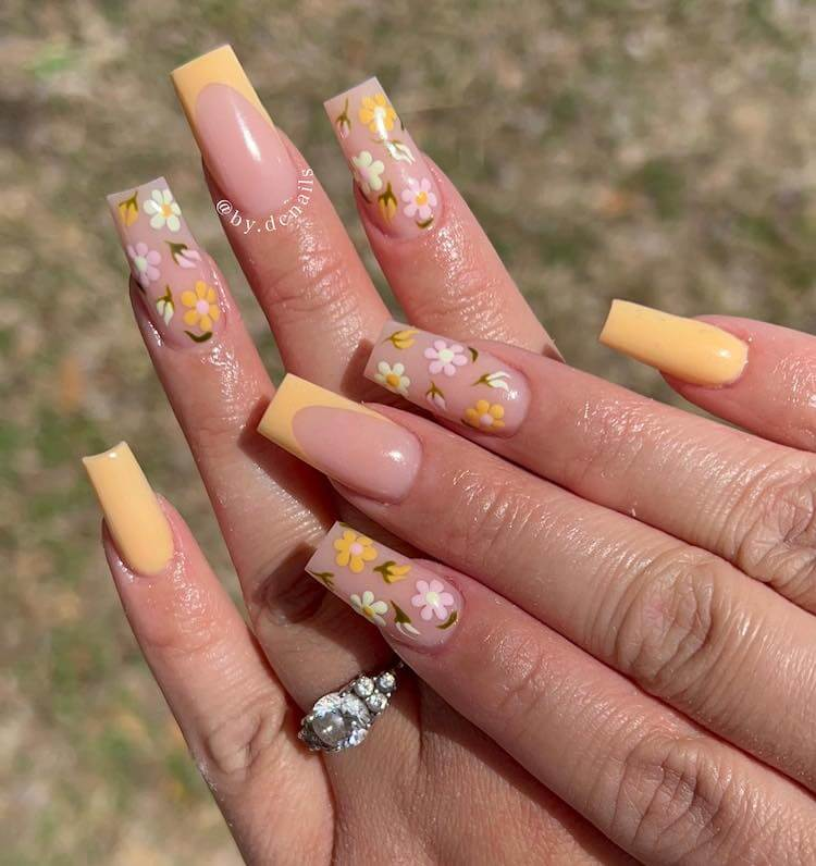 Full view of the yellow flowered tapered nails