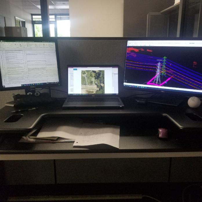 A desk with a computer and a monitor on it

Description automatically generated with low confidence