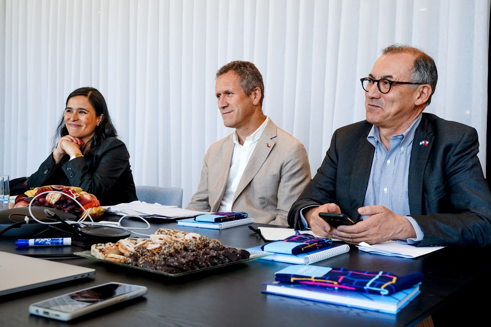 From left to right: Ms. Marion Fuentes; Minister Juan Carlos Muñoz Abogabir; and Ambassador Jorge Carvajal at a meeting with Optibus representatives to discuss the role of technology in securing the future of public transportation in Chile.