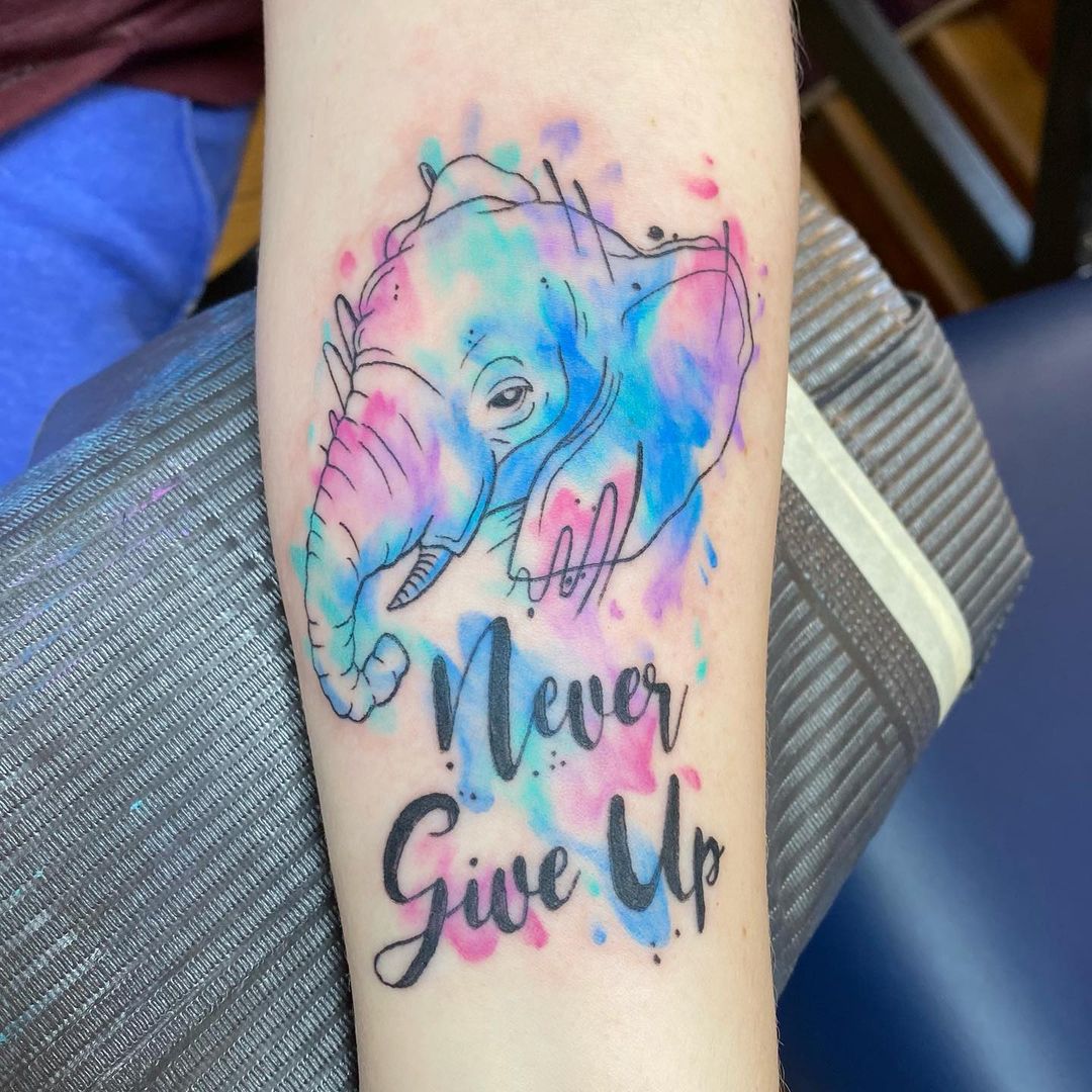 ‘Never Give Up’ Elephant Forearm Tattoo 