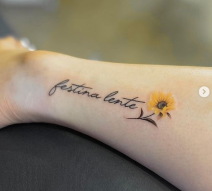 Small Lettering And Sunflower Tattoo