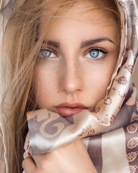 women with beautiful eye wearing chic head scarf