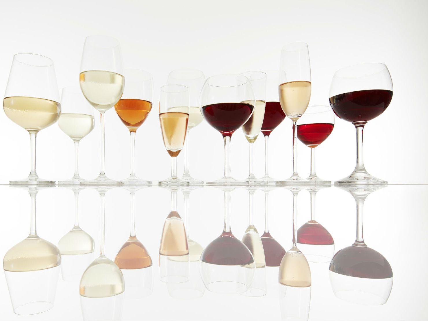 A group of wine glasses with red wine in them  Description automatically generated with low confidence