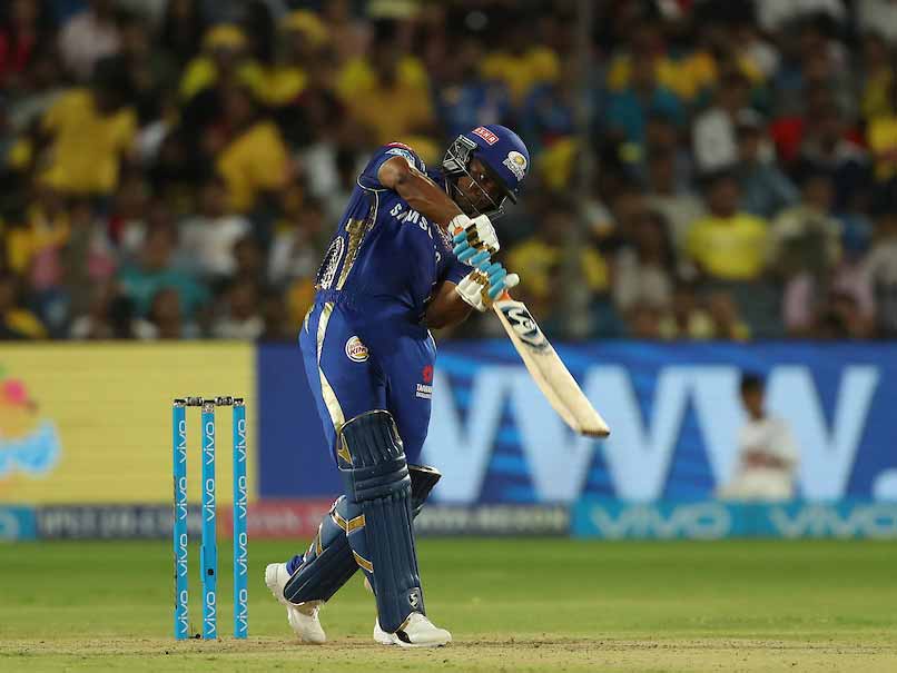 Evin Lewis slogging the ball whilst representing Mumbai Indians