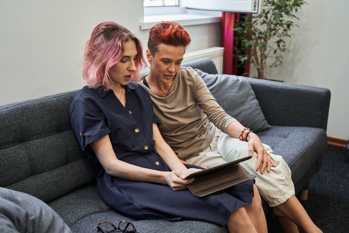Mental health digital intervention: couple looking at a tablet