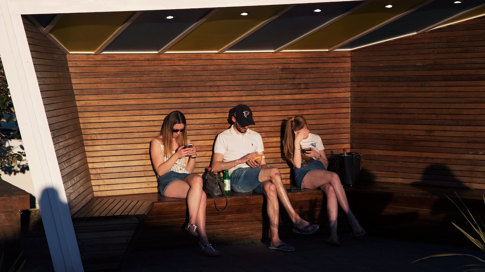 three people on phone