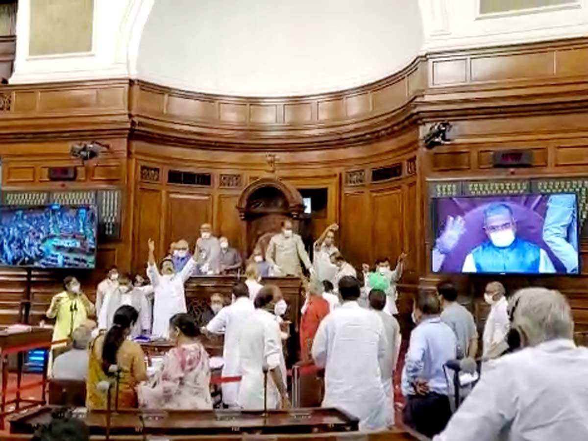 Bedlam in RS as it passes 2 key farm bills; papers torn by protesting  opposition members - The Economic Times