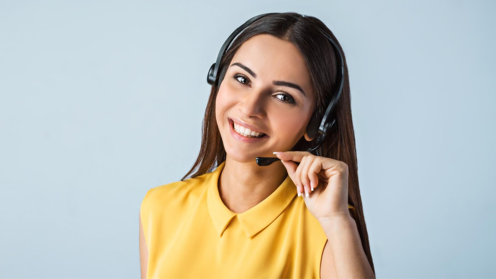 A call center representative looking at the camera. 