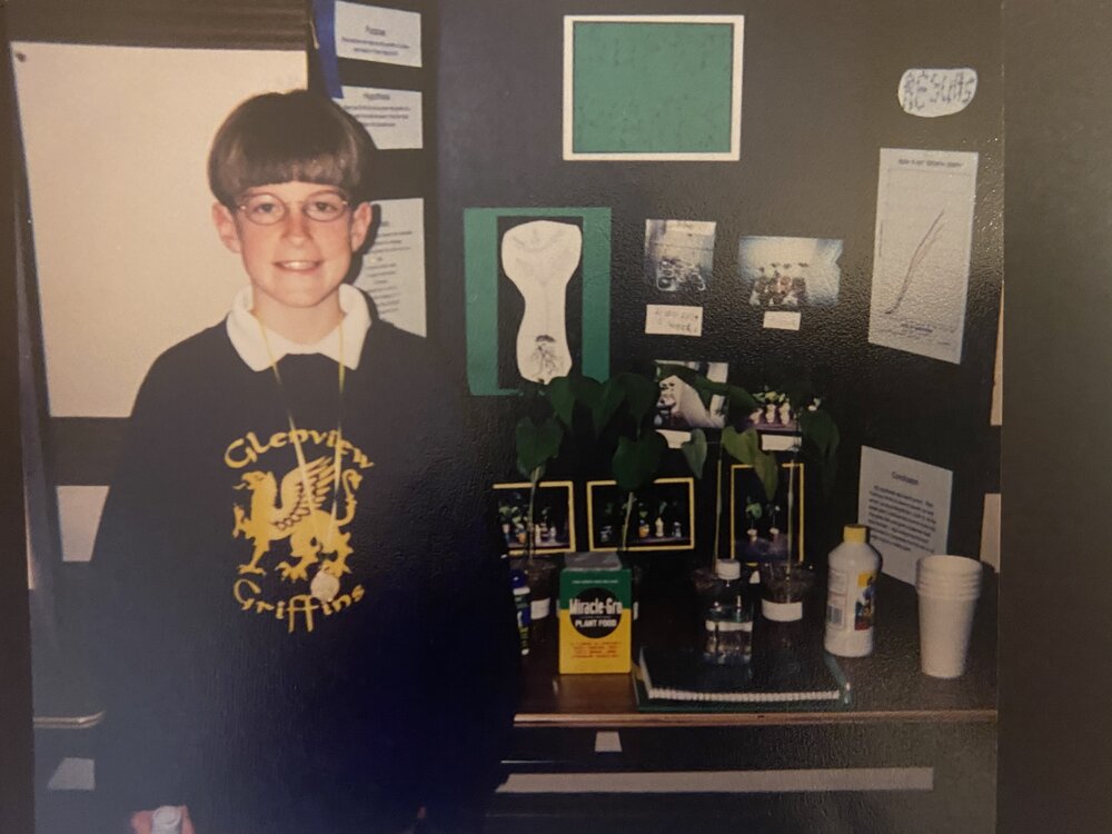 Chadwick Swenson in front of his 2nd grade science fair project in 1996