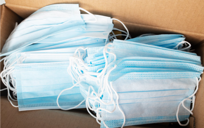 PPE masks in a moving box