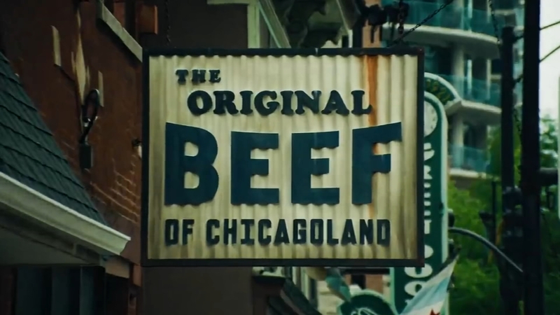 A mounted sign that reads “THE ORIGINAL BEEF OF CHICAGOLAND.”