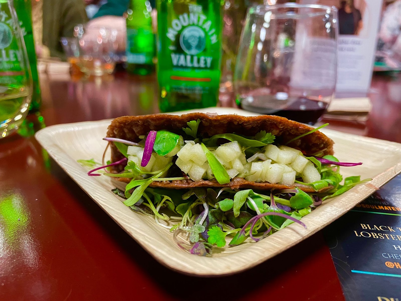 Host Chef for Masters of Taste 2023, Chef Michael Reed of Poppy + Seed in Anaheim presented a duck confit taco on a crispy rye taco shell.