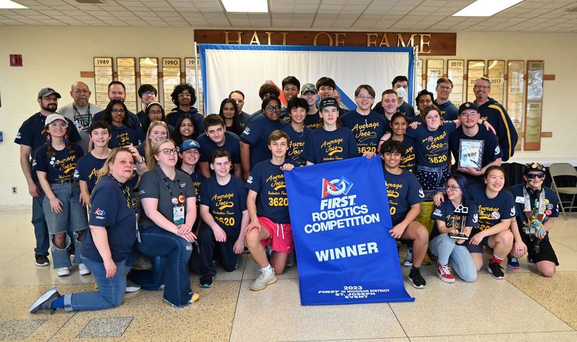May be an image of ‎9 people, people standing and ‎text that says '‎1989 2012 2017 Average Joes Fverc Average 2023 lobobiT Avera Average 3620 3620 verage sשי 620 FIRST. COMPETITION ROBOTICS WINNER 2023 FIRST‎'‎‎