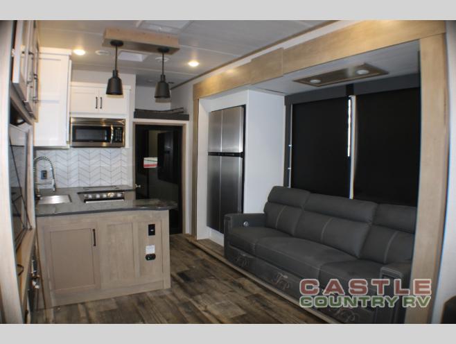 Entertaining guests and cooking for your family is easy in this RV.