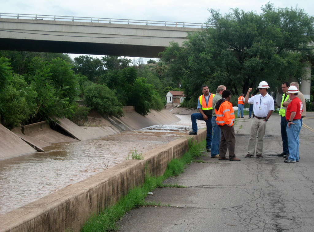 Emergency response team in visibility vests planning work