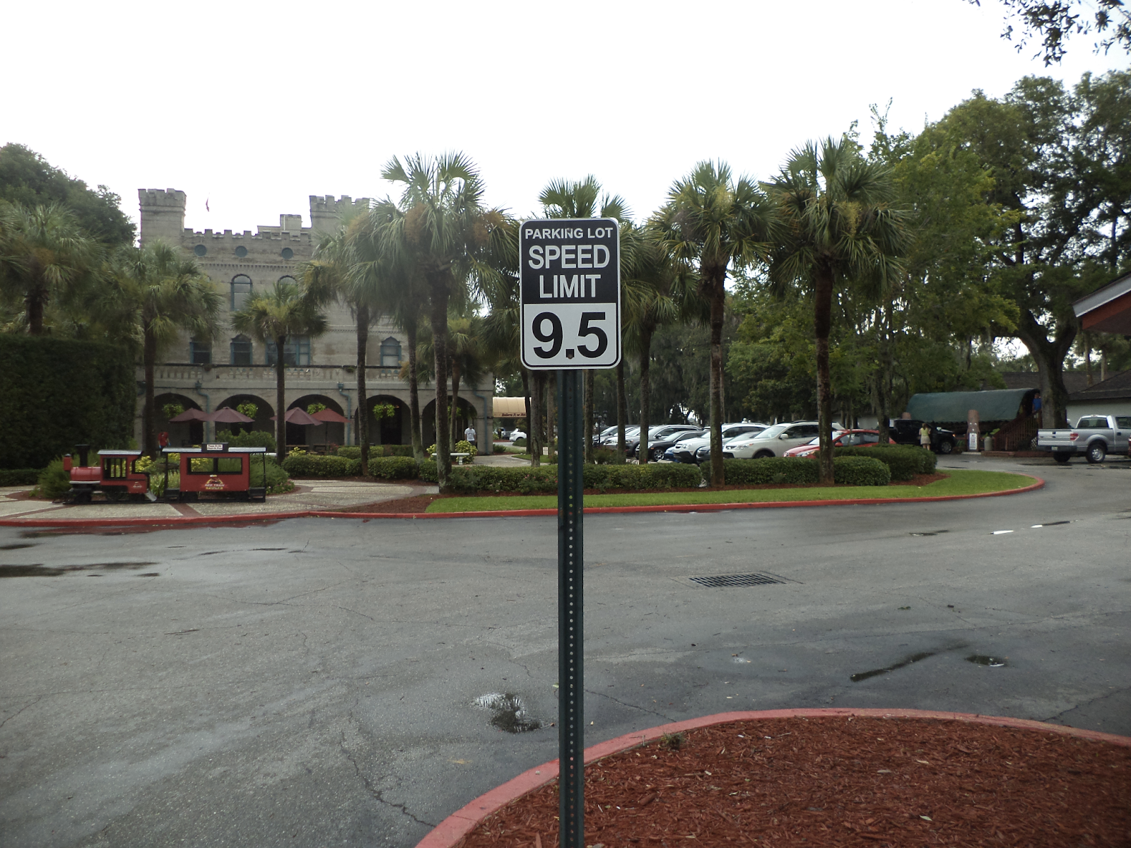 As we've already mentioned, the building owner has the right to regulate speed on their own site. You can always count on seeing a sign posted near the parking area's entryway that displays the official speed restriction. Typically, the sign consists of a specific number preceded by "M" or "MPH."
